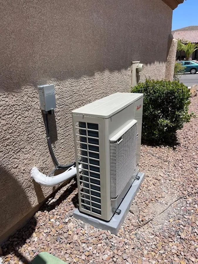 Residential air conditioning condenser unit in Marcy